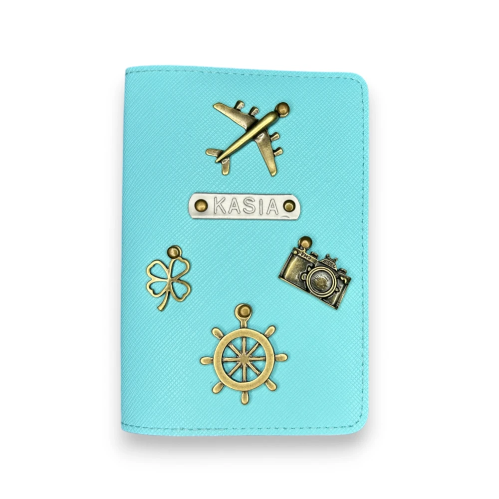 Personalizowane etui na paszport pokrowiec z przypinkami turkusowy.webp
